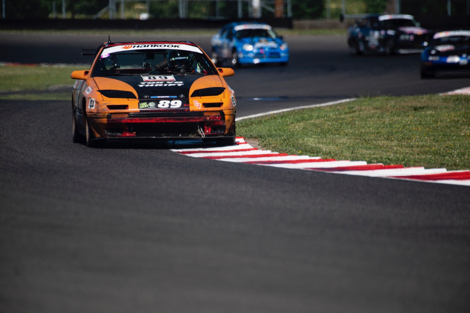 #89 on the curbing at corner exit